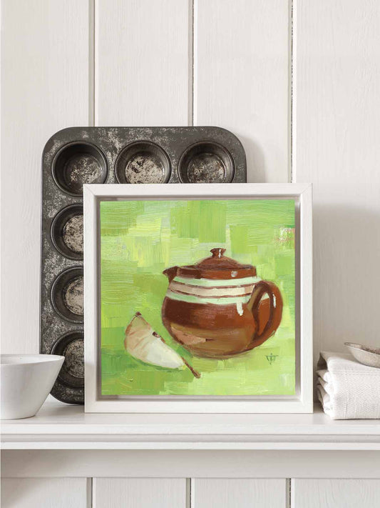 Vintage brown teapot painting in white tray frame displayed on kitchen shelf