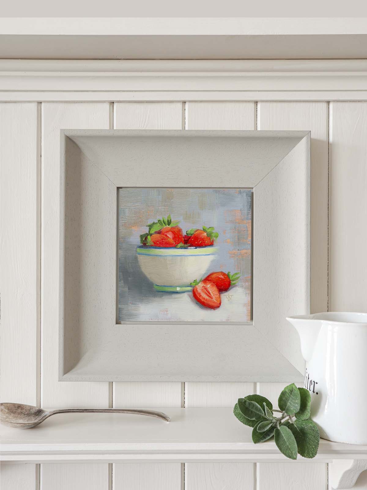 Touch of Summer strawberry painting in grey modern frame hanging on kitchen wall