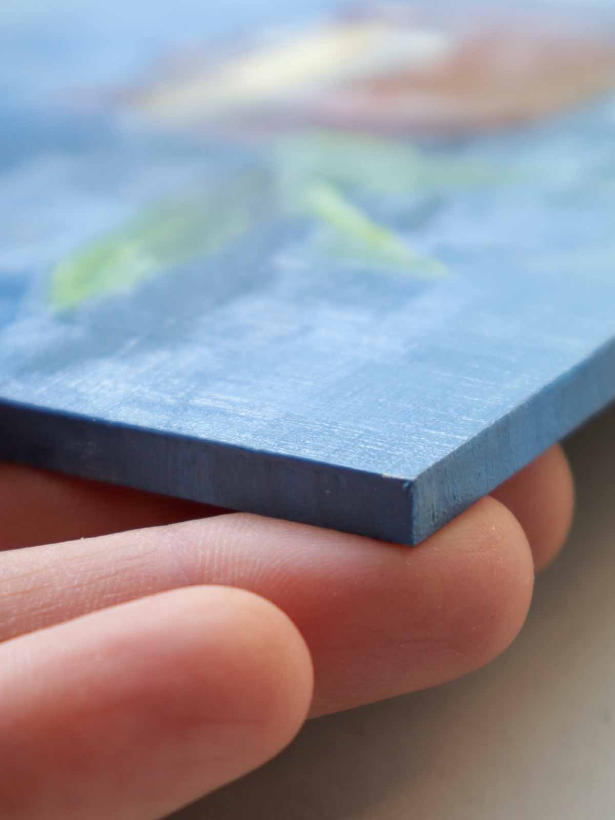 Side edge of teapot painting showing thickness of painting board