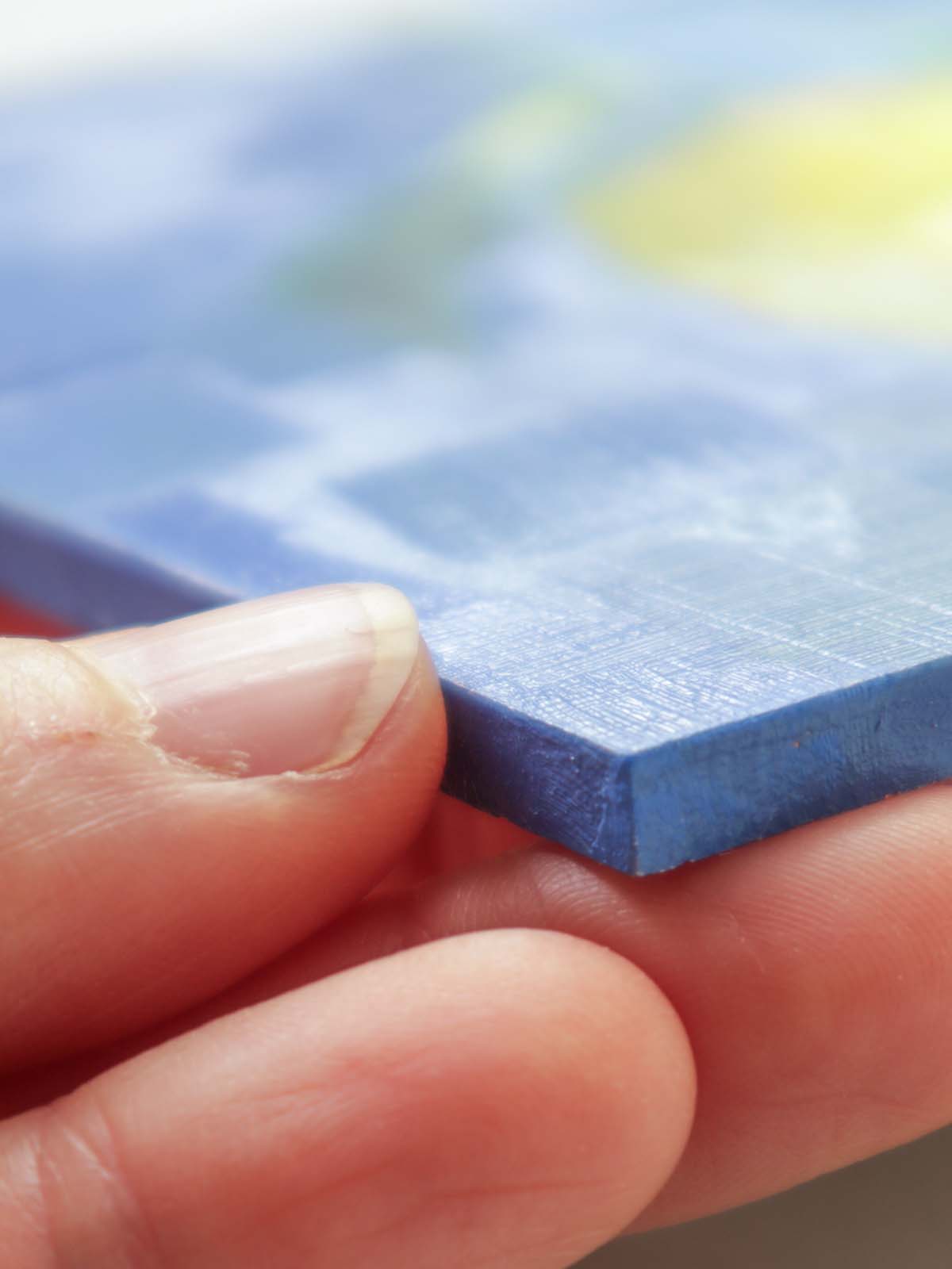 Side edge of lemon painting showing thickness of painting board