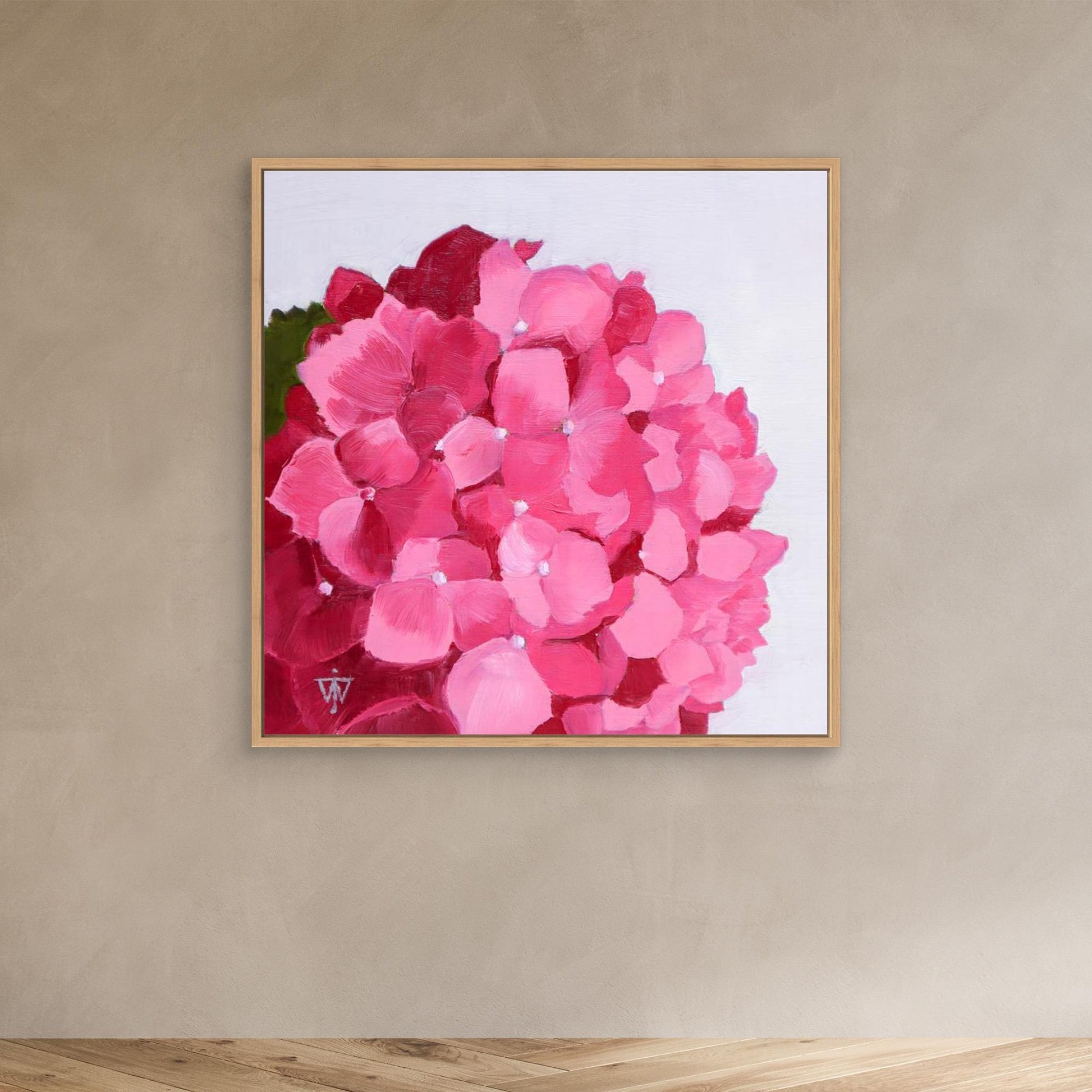 Forever Bloom pink hydrangea oil painting canvas print in natural wood floating frame on darker wall with wooden floor