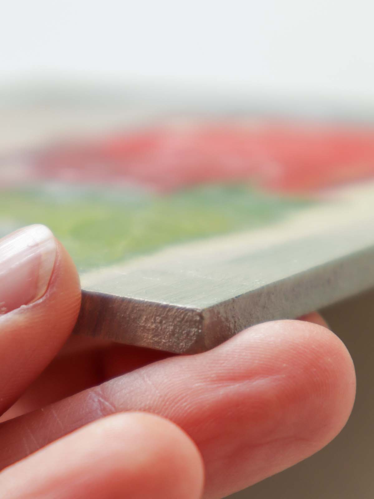 Side edge of teapot painting showing thickness of painting board