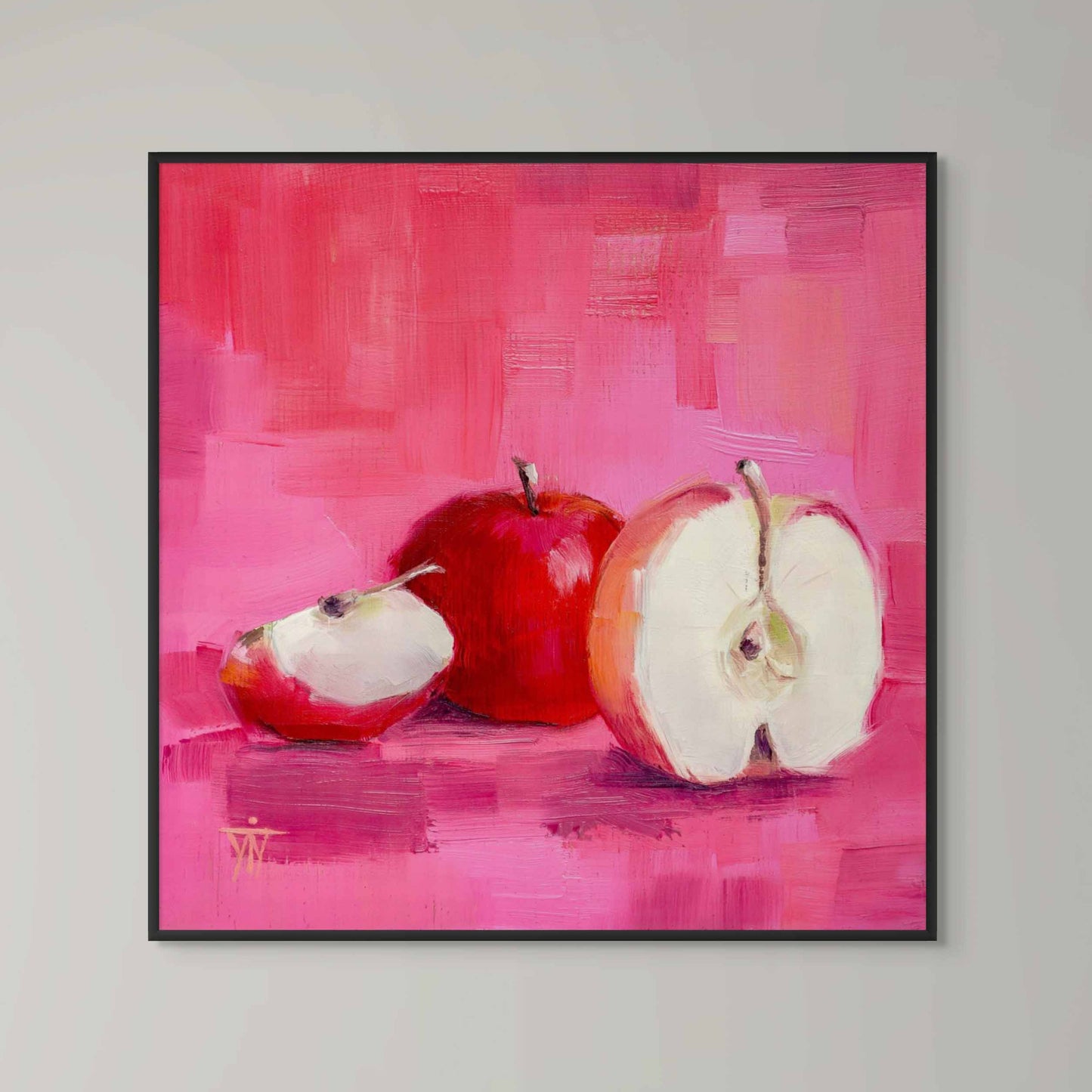 Framed painting of apples on a pink background