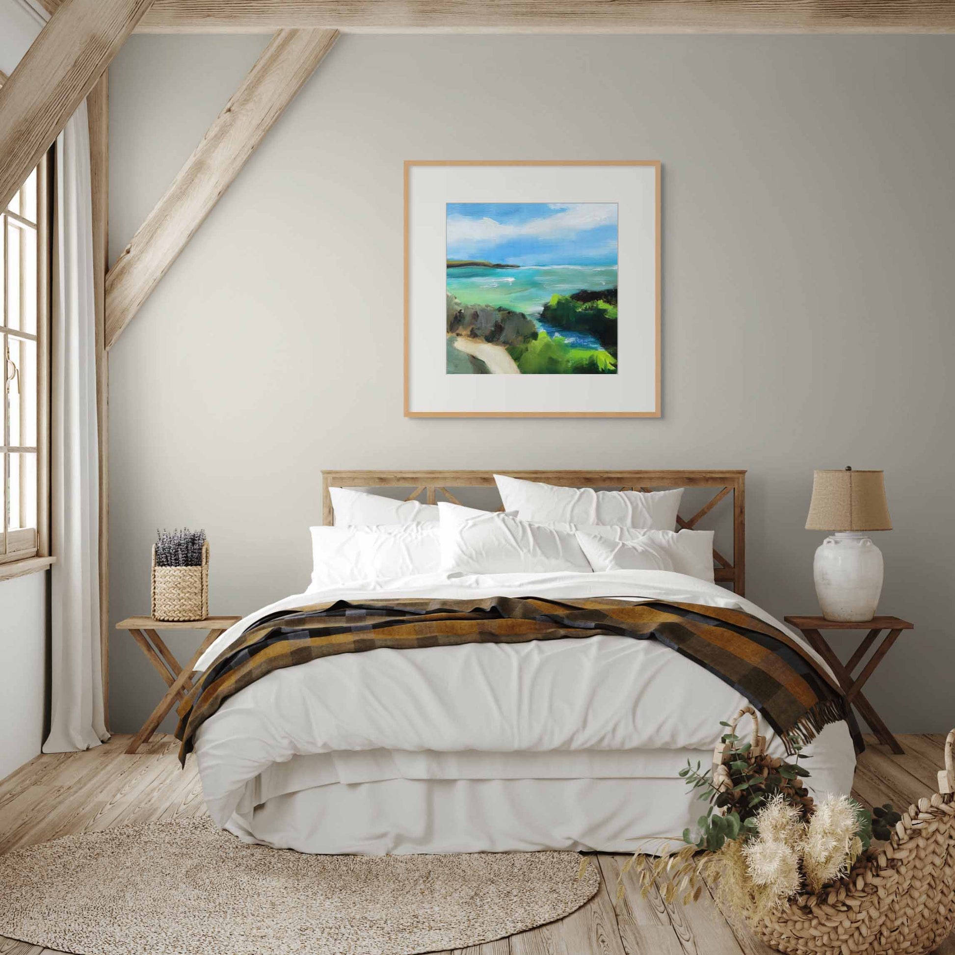 Large artwork in master bedroom above wooden bed with white bedding.