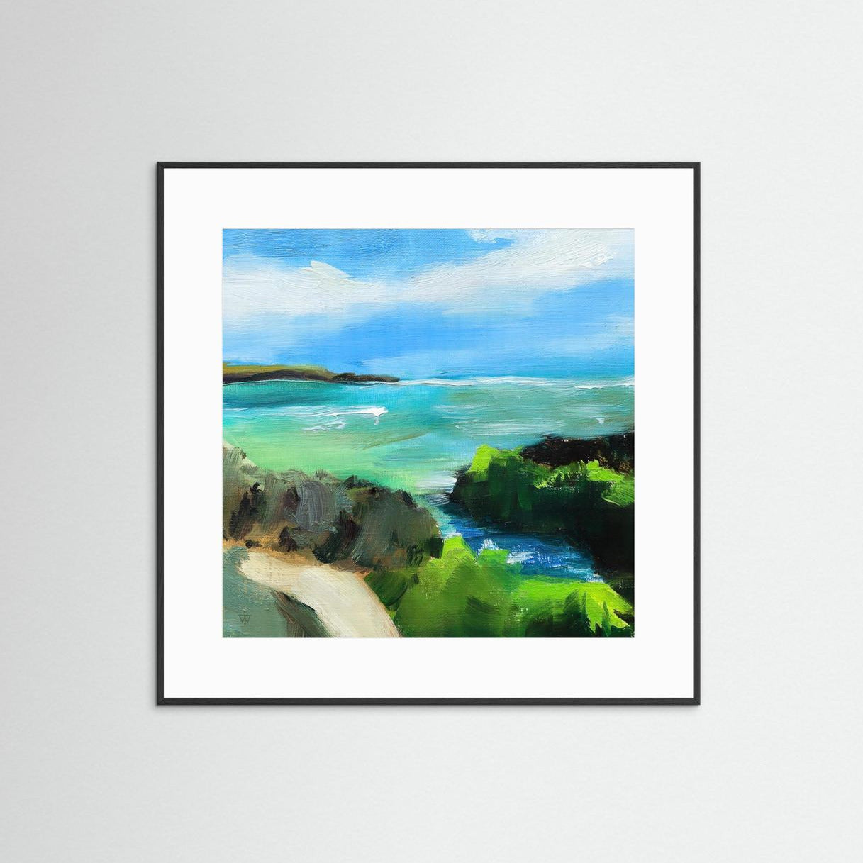 Framed painting of a coastal landscape with blue sky and green rocks.