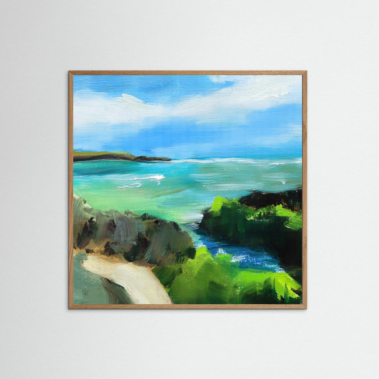 Framed painting of a seascape with turquoise sea and green rocks.